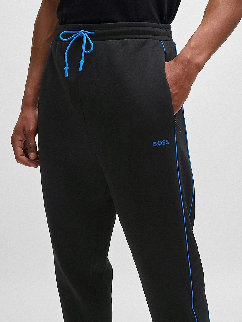Stretch-Cotton Tracksuit Bottoms with Embossed Artwork