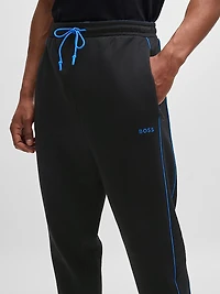 Stretch-Cotton Tracksuit Bottoms with Embossed Artwork