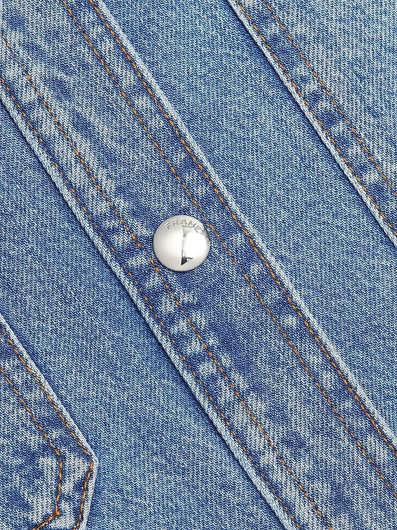 The Sleeveless Front-Snap Denim Mini Shirtdress