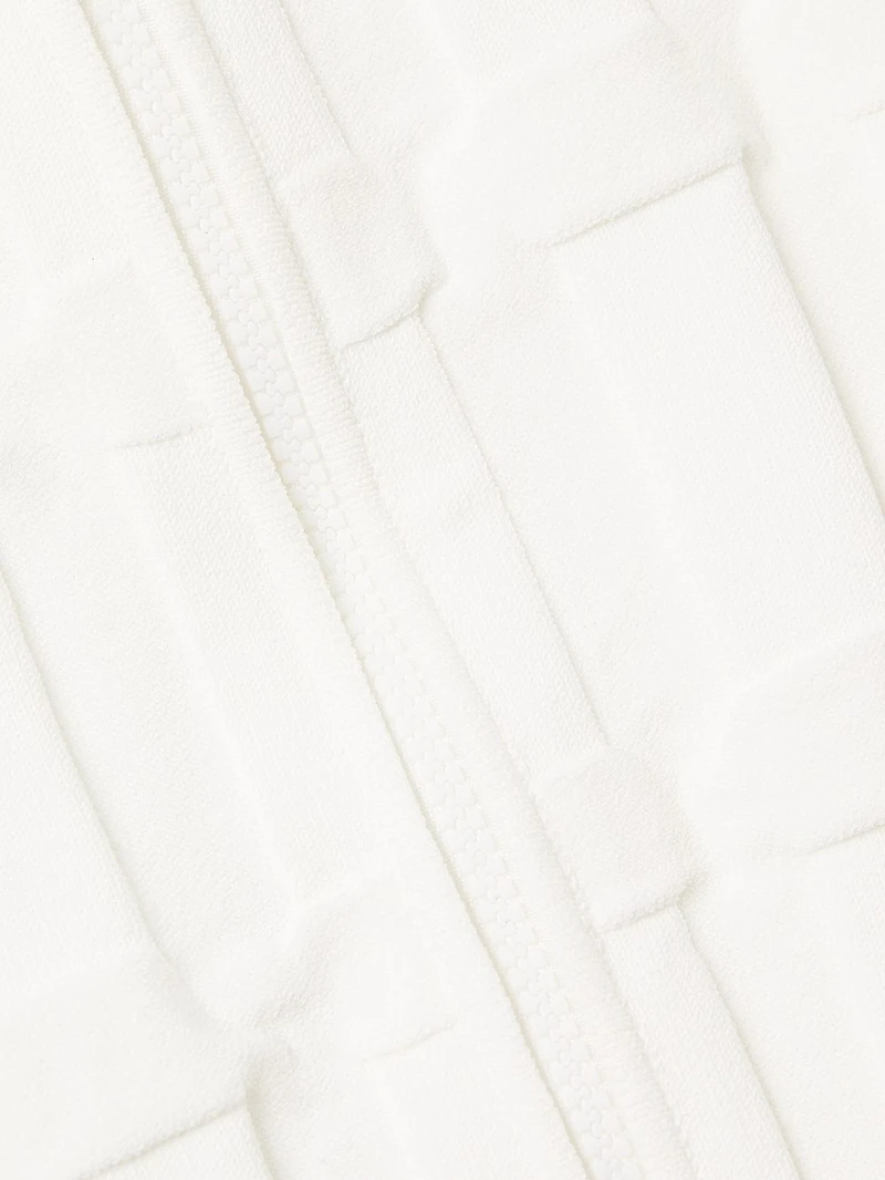 The Sax Embossed Sleeveless Front-Zip Sweater