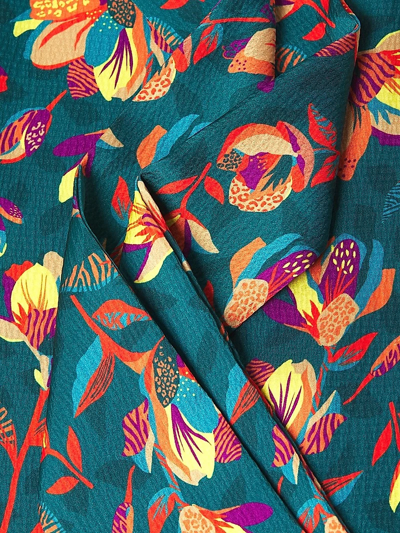 Everyday Tropics Sleeveless Tie Blouse