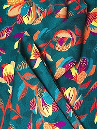 Everyday Tropics Sleeveless Tie Blouse