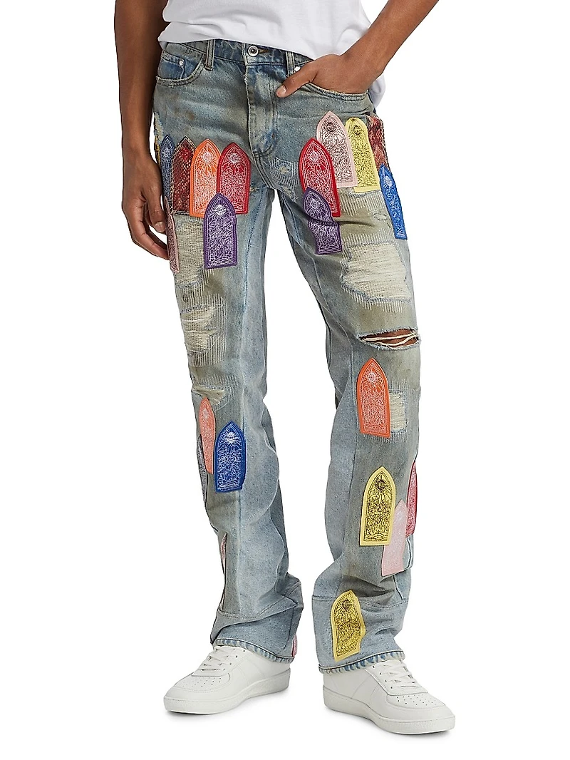 Patch Arched Repaired Distressed Jeans