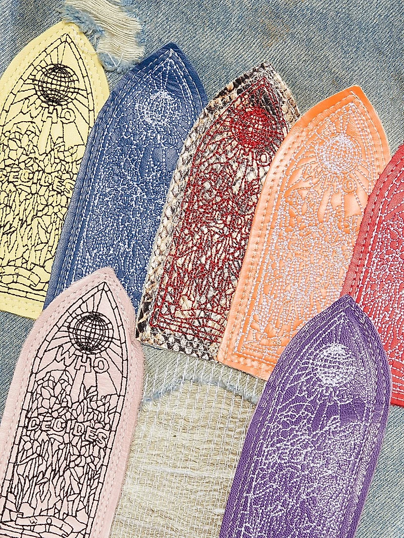 Patch Arched Repaired Distressed Jeans