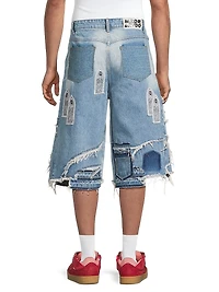 Patched Arch Blowout Denim Shorts