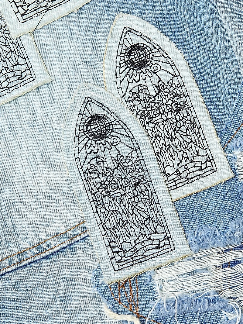 Patched Arch Blowout Denim Shorts