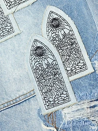 Patched Arch Blowout Denim Shorts