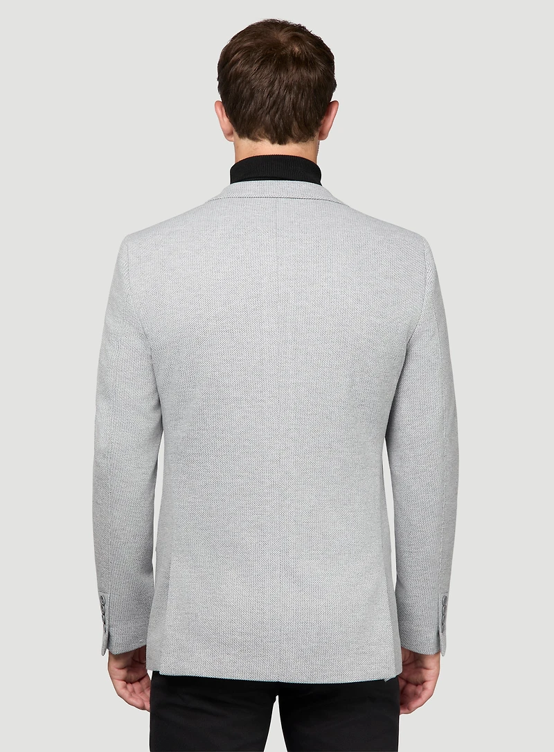 Veston en tricot gris