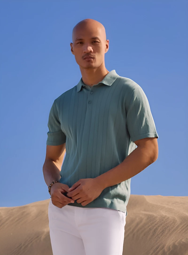 Polo uni à tricot côtelé