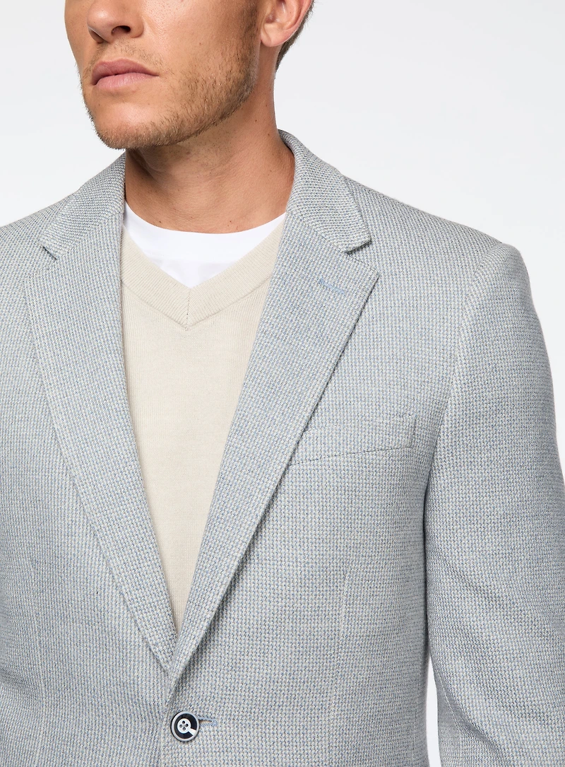 Veston en tricot bleu pâle