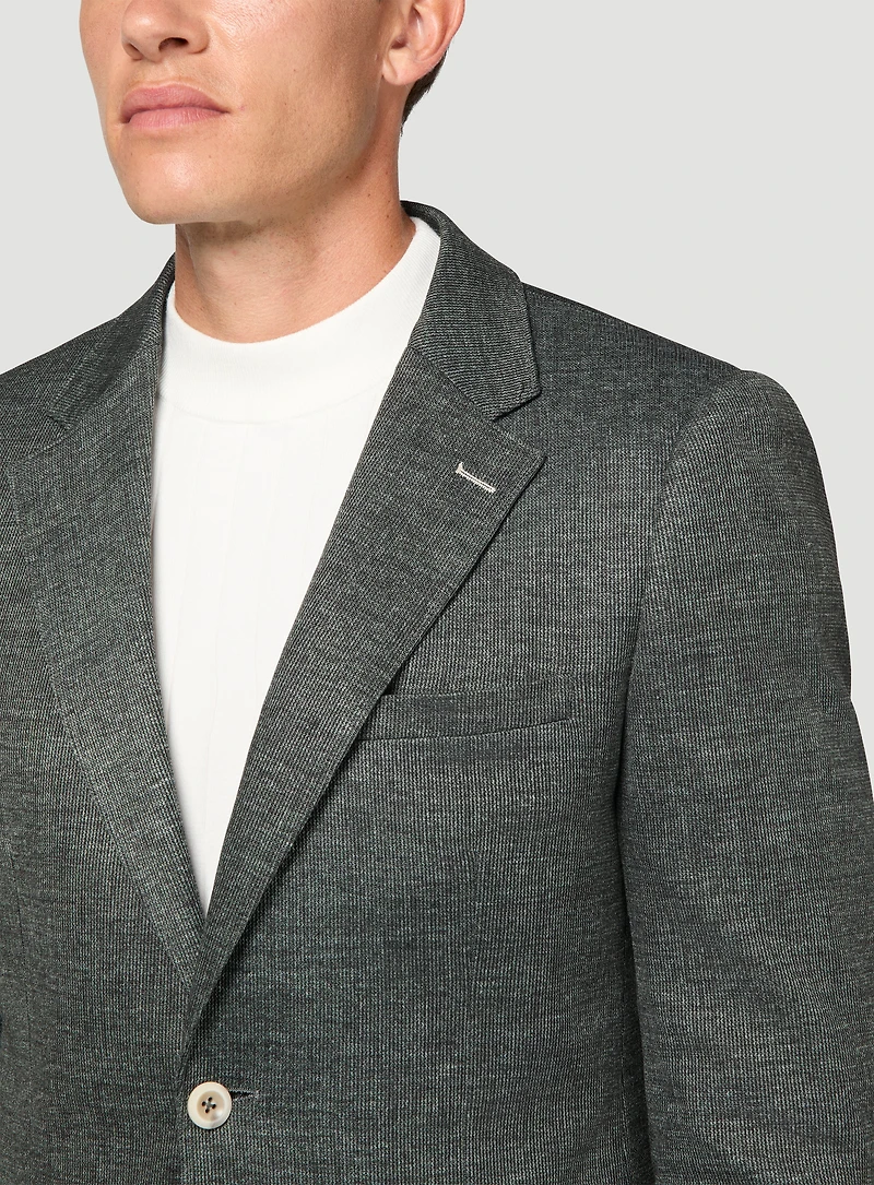 Veston vert en tricot vertical