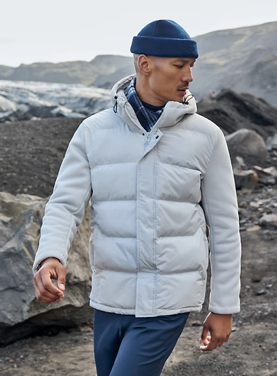 Manteau matelassé avec manches en tricot