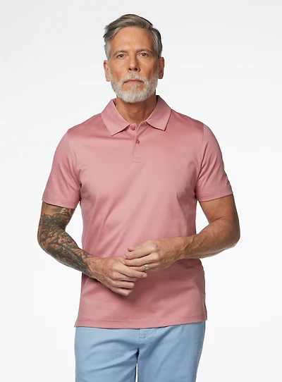Polo rose en tricot uni