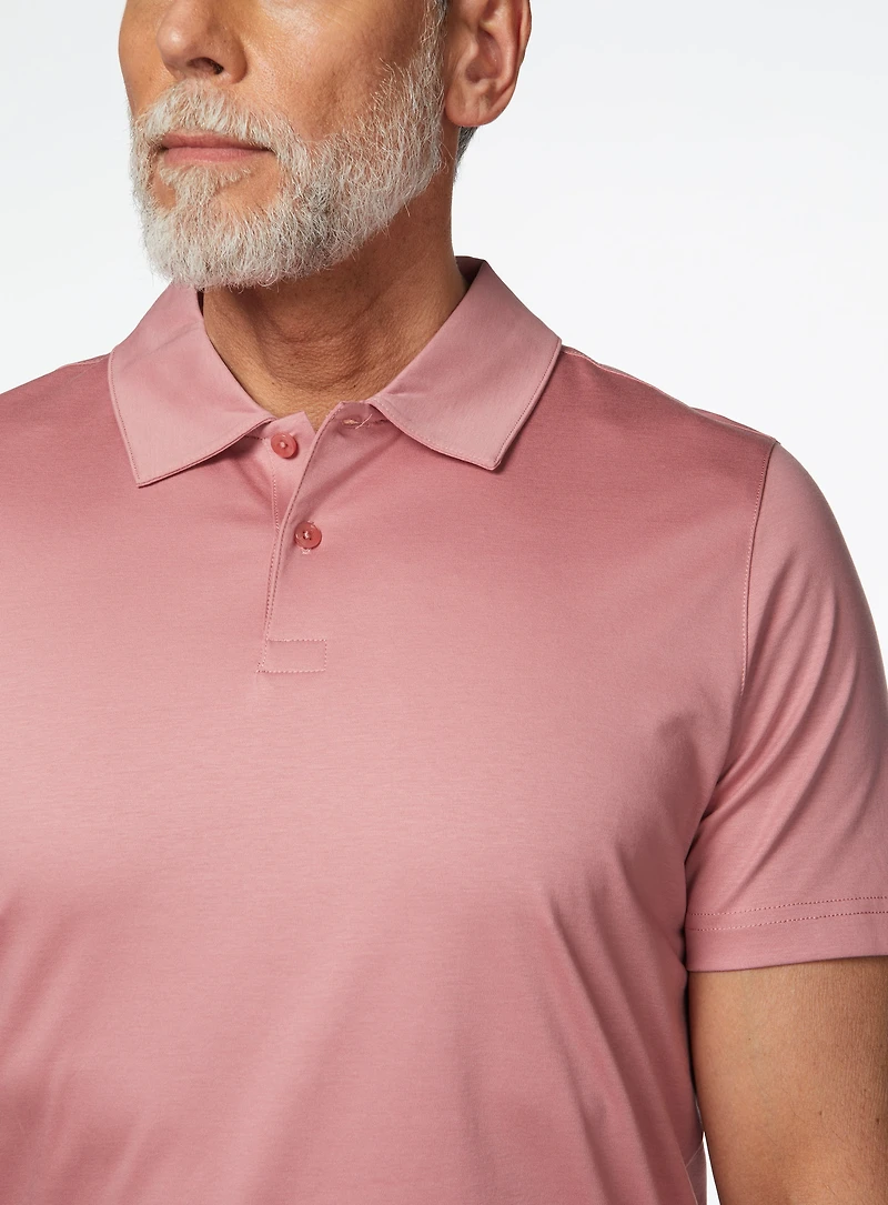 Polo rose en tricot uni