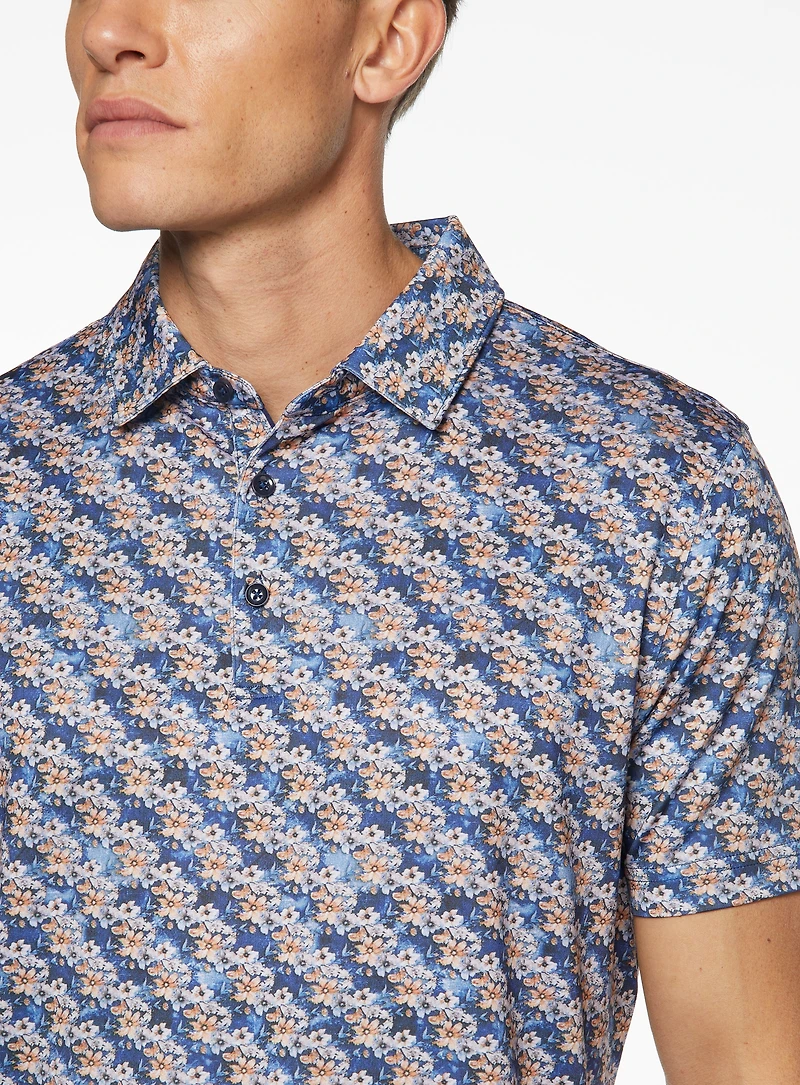 Polo performance à motif floral