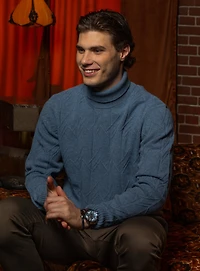 Chandail à col roulé en tricot torsadé