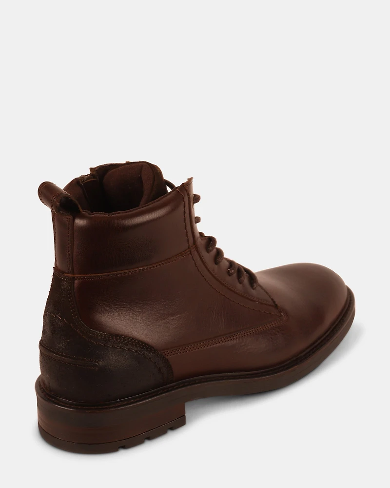 UNCANNY BROWN LEATHER