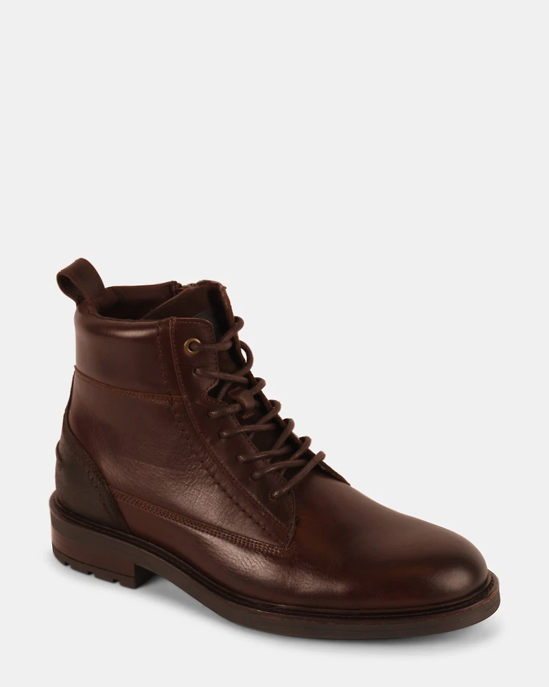 UNCANNY BROWN LEATHER