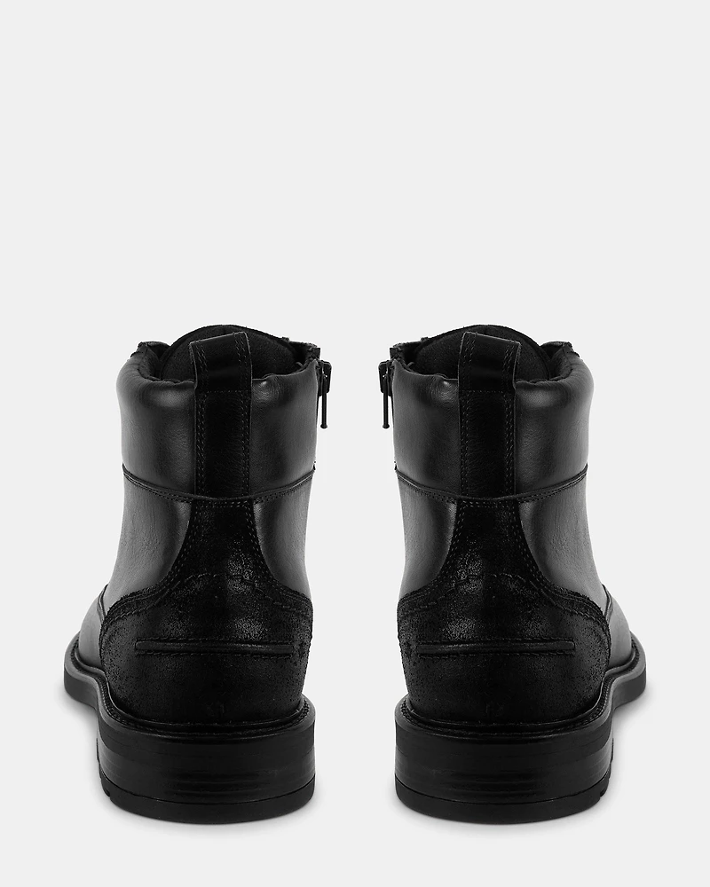 UNCANNY BLACK LEATHER