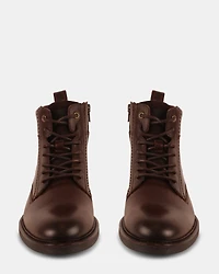 UNCANNY BROWN LEATHER