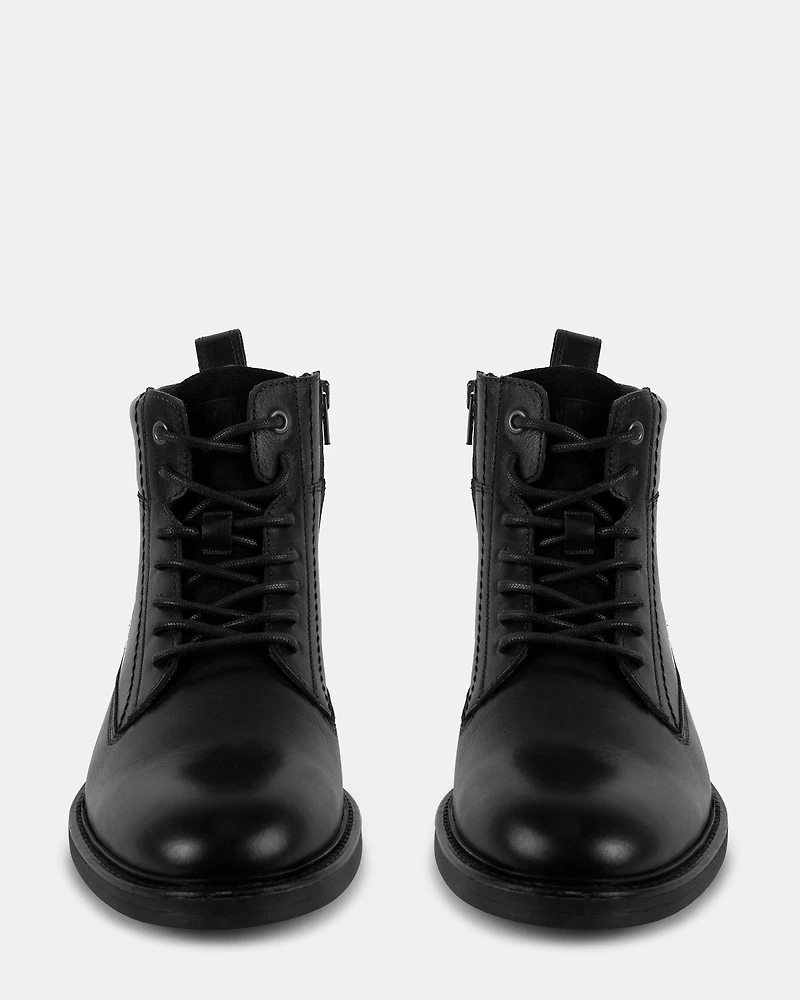 UNCANNY BLACK LEATHER