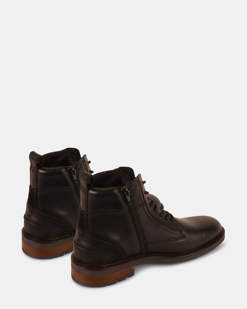 UNCANNY BLACK LEATHER