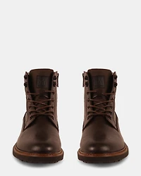 UNCANNY BROWN LEATHER