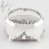Silver oval music box