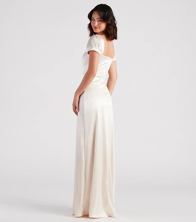 Windsor Emelia Satin Puff Sleeve High Slit Formal Dress at CoolSprings Galleria in Franklin, TN Windsor Emelia Satin Puff Sleeve High Slit Formal Dress at CoolSprings Galleria in Franklin, TN