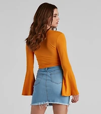 Wrapped Chic Bell Sleeve Top