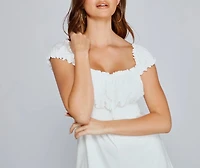 Flirty Style Smocked Romper