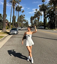 Sweet Muse Strapless Bow-Detail Skater Romper