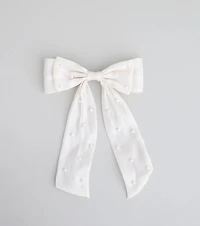 Tied With a Pearl Hair Bow