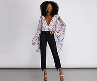 The Drama Bell Sleeve Bodysuit