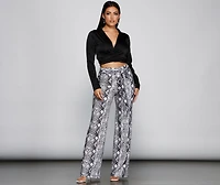 So Sassy Tie Waist Snake Print Pants