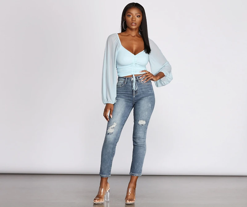 High Rise Distressed Tapered Jeans