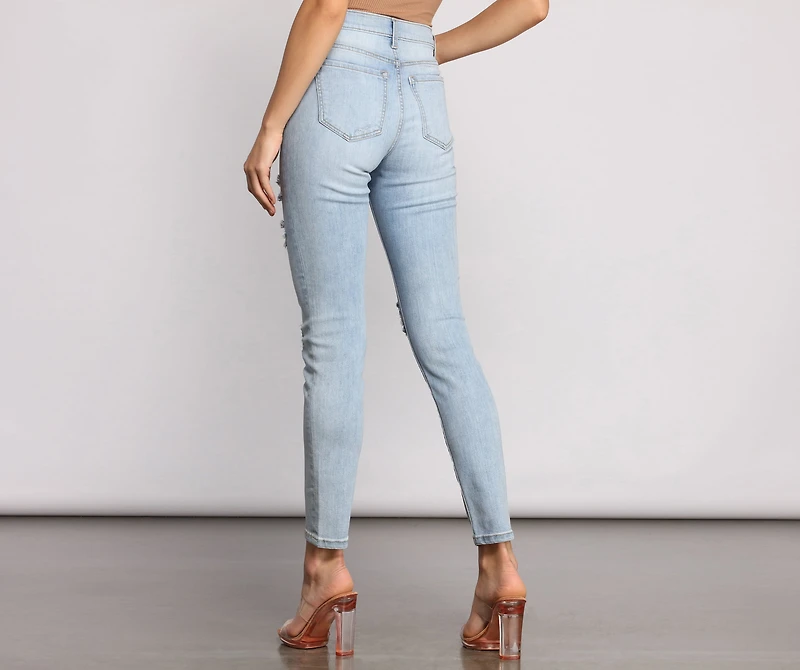 Mid Rise Destructed Skinny Jeans