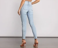 Mid Rise Destructed Skinny Jeans