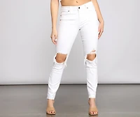 Jude Mid-Rise Destructed Knee Skinny Jeans