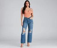 Distressed, But Well Dressed Boyfriend Jeans