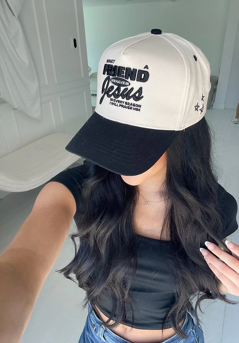 Black Friend in Jesus Trucker Hat
