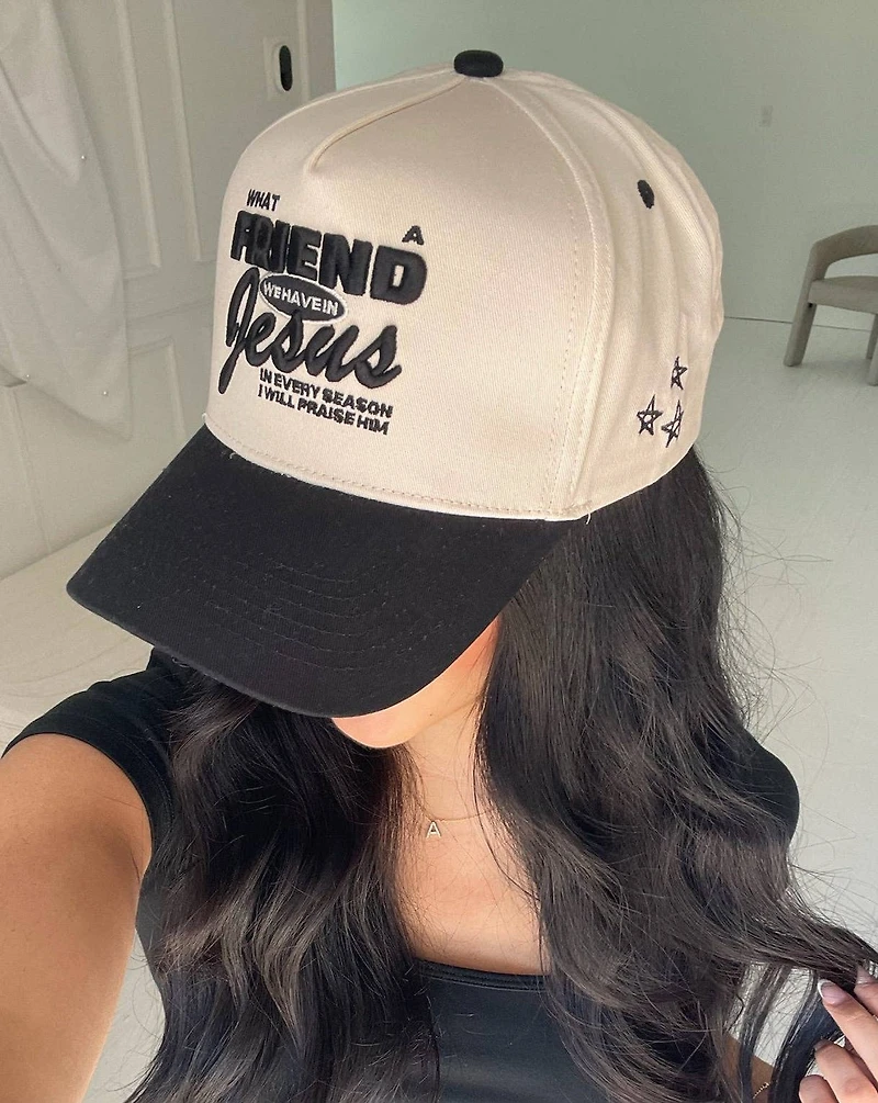 Black Friend in Jesus Trucker Hat