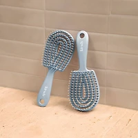 Mini Haze Blue Detangling Flexi Brush