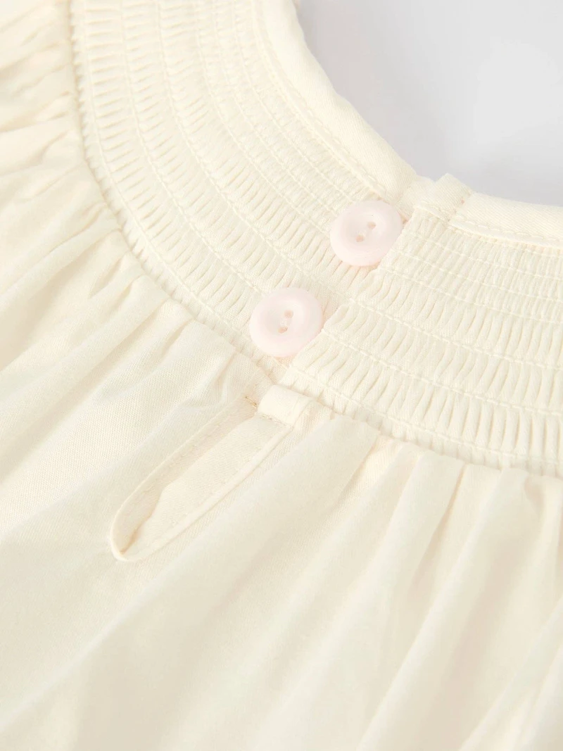 Christmas Girl's Romper with Red Bow Details