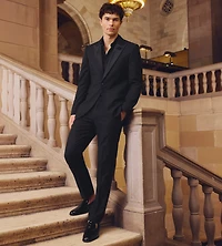 Veste de smoking unie noire à revers en pointe et coupe slim