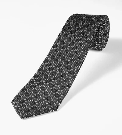 Cravate à motif floral géométrique