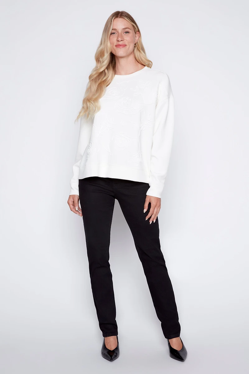 Le pull en coton avec détails soutache