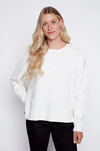 Le pull en coton avec détails soutache