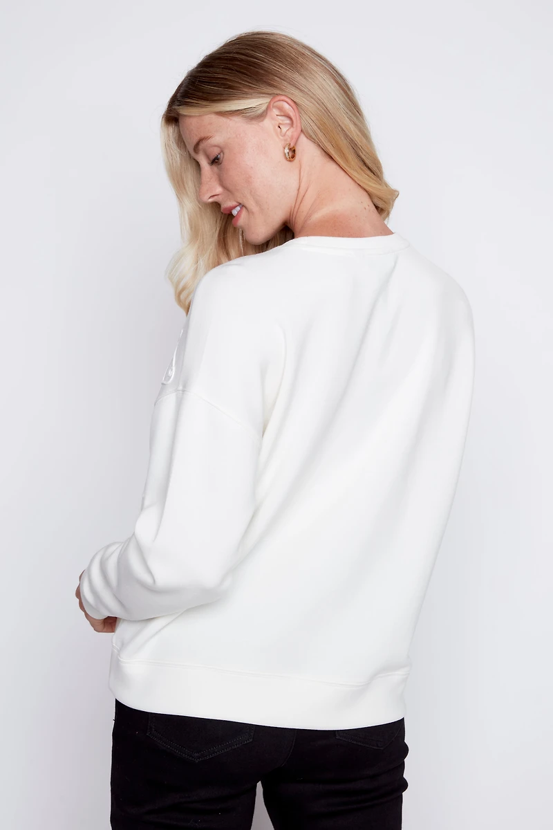 Le pull en coton avec détails soutache
