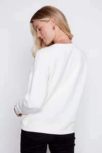 Le pull en coton avec détails soutache